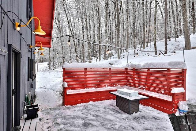 view of snow covered patio