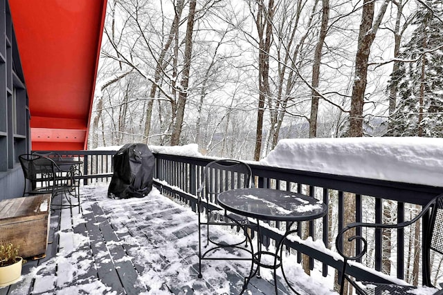 view of snow covered deck