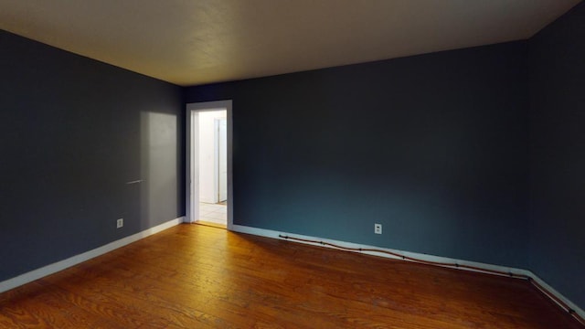 empty room featuring hardwood / wood-style floors