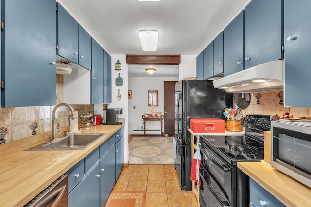 kitchen featuring decorative backsplash, stainless steel appliances, blue cabinets, and sink