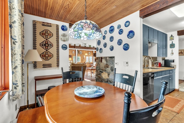 tiled dining area with wood ceiling and sink