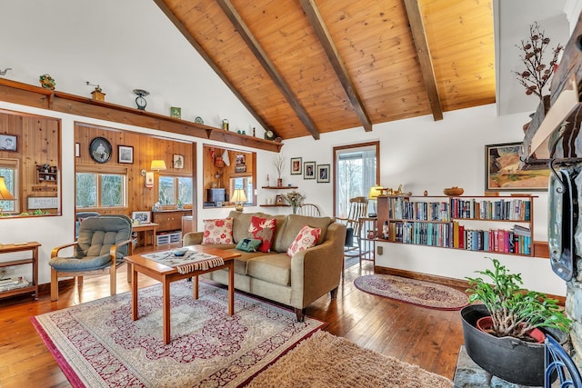 living room with beam ceiling, high vaulted ceiling, wood ceiling, and hardwood / wood-style flooring