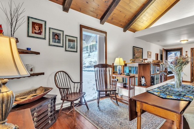 sitting room with lofted ceiling with beams, dark hardwood / wood-style floors, and wood ceiling