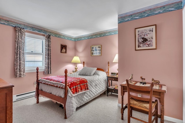 bedroom with carpet and a baseboard radiator