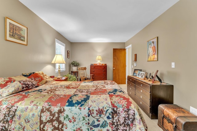 bedroom featuring light colored carpet