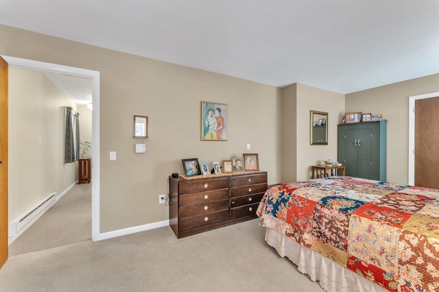 carpeted bedroom with a baseboard radiator