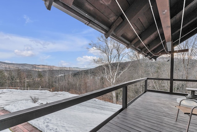 view of snow covered deck