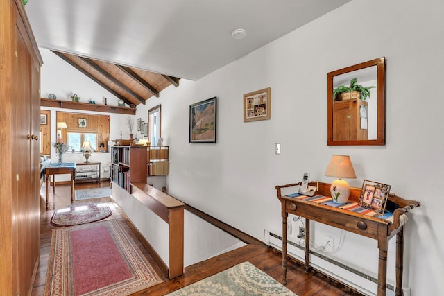 hallway with vaulted ceiling with beams, wooden ceiling, dark wood-type flooring, and a baseboard heating unit