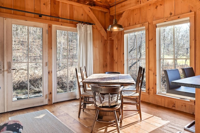 sunroom with beamed ceiling