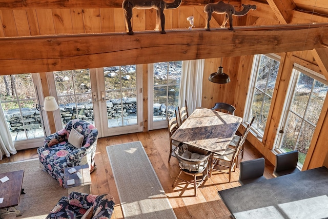 sunroom with vaulted ceiling with beams and wooden ceiling