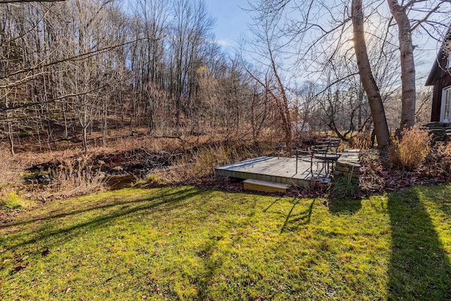 view of yard featuring a deck