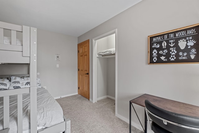 bedroom featuring light carpet