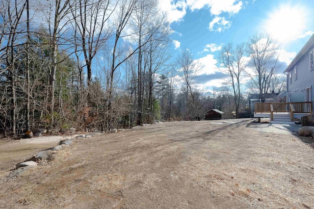 view of yard featuring a deck