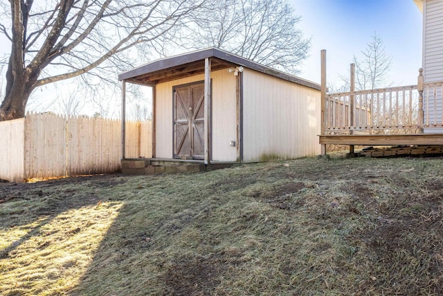 view of outbuilding with a yard