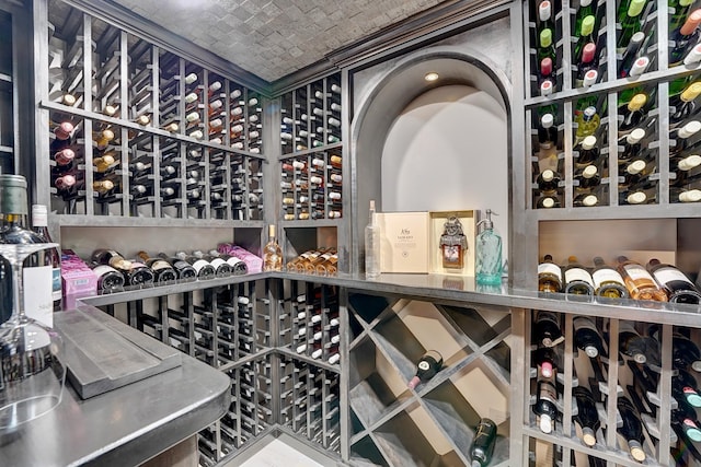 wine room with brick ceiling