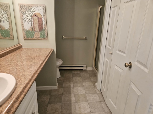 bathroom with vanity, toilet, an enclosed shower, and a baseboard heating unit