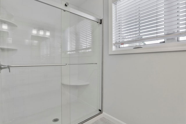 bathroom featuring walk in shower