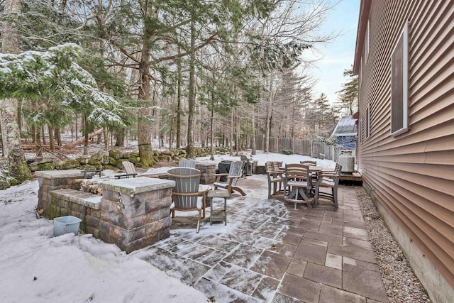 view of snow covered patio