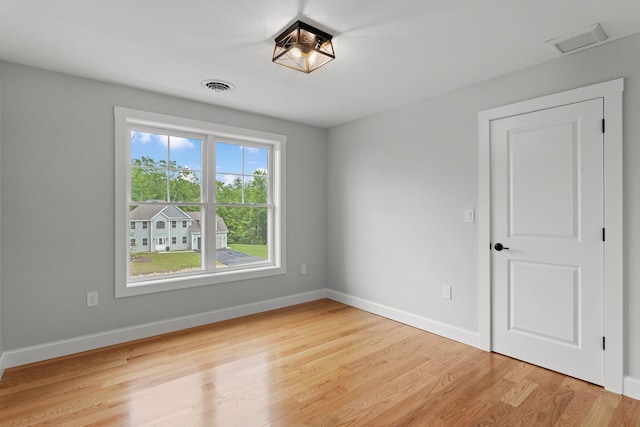 empty room featuring light hardwood / wood-style floors