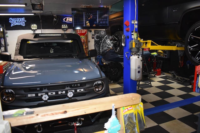 garage featuring a garage door opener