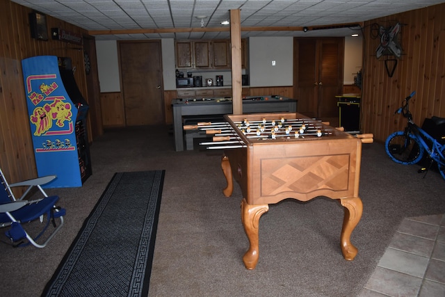 playroom with wood walls