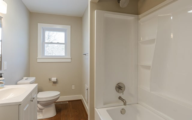 full bathroom featuring toilet, vanity, shower / bath combination, and hardwood / wood-style flooring