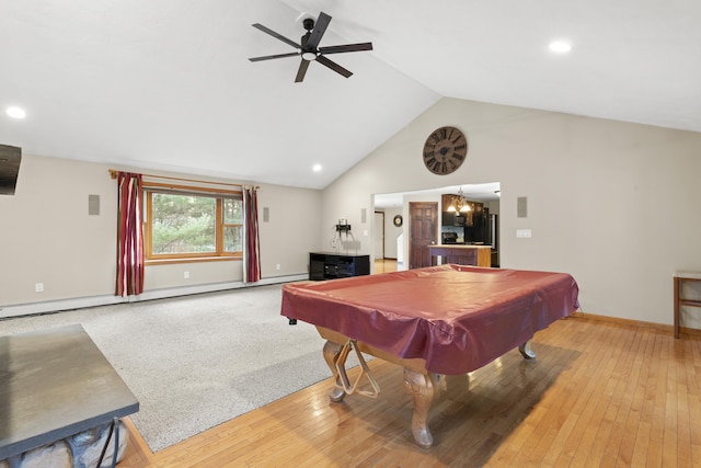 recreation room with hardwood / wood-style floors, ceiling fan with notable chandelier, pool table, and vaulted ceiling