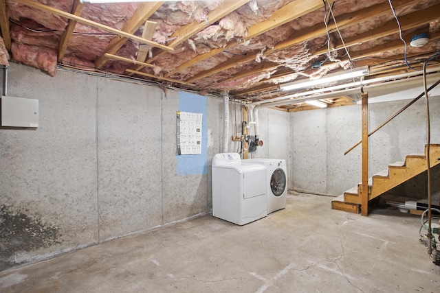 basement with separate washer and dryer