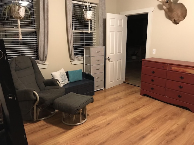 living area with light hardwood / wood-style floors