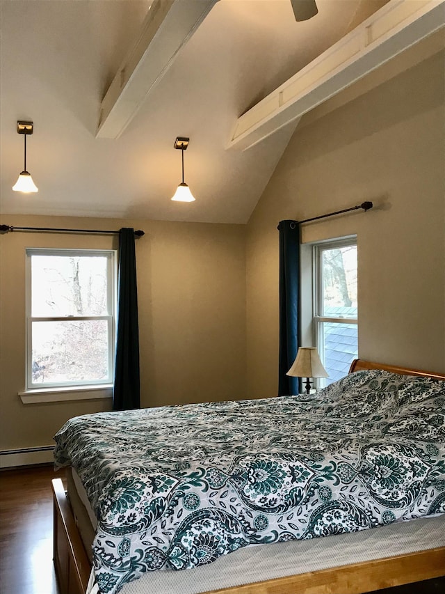 bedroom featuring vaulted ceiling with beams, dark hardwood / wood-style flooring, and baseboard heating