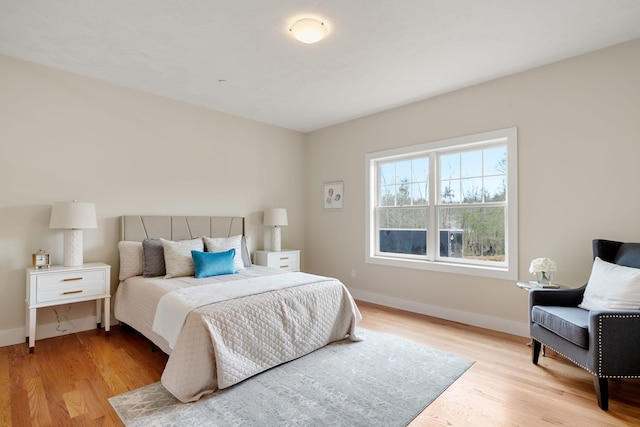 bedroom with light hardwood / wood-style floors