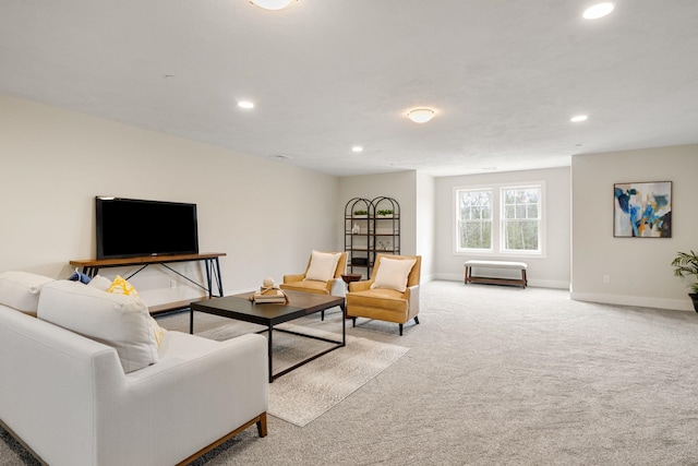 living room featuring light carpet