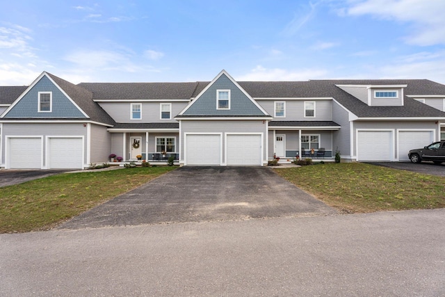 view of front of home featuring a porch and a front lawn