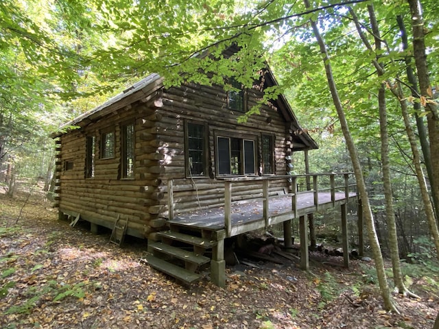 view of home's exterior with a deck