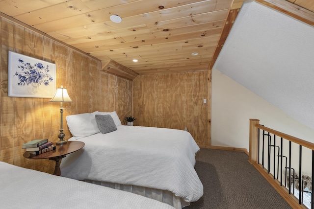 carpeted bedroom featuring lofted ceiling, wood ceiling, and wooden walls