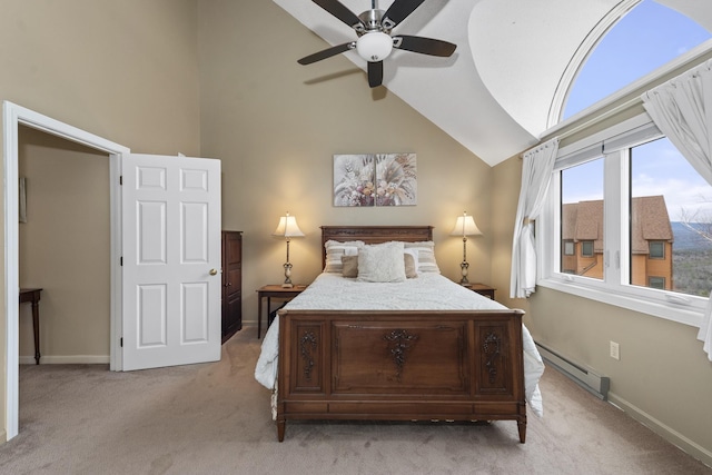 bedroom featuring light carpet, lofted ceiling, ceiling fan, and a baseboard heating unit