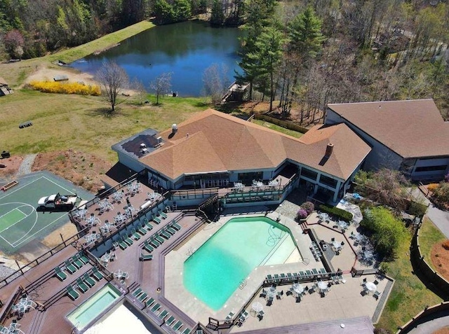 birds eye view of property featuring a water view