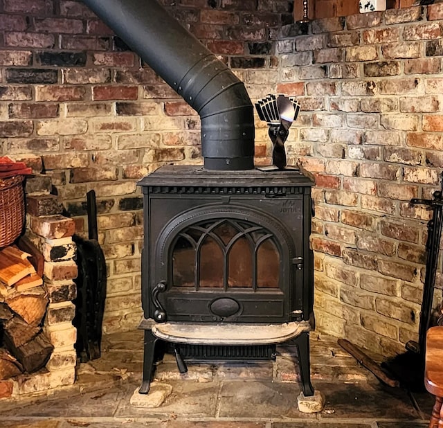 interior details featuring a wood stove