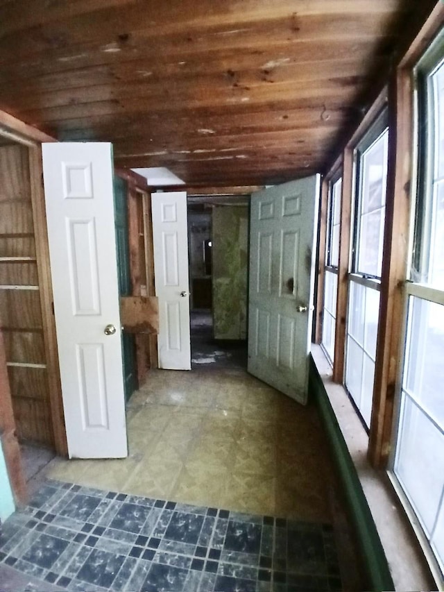 interior space featuring wood ceiling