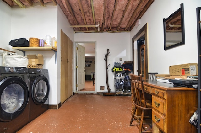 washroom with washing machine and clothes dryer