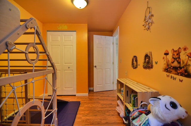 bedroom featuring a closet and hardwood / wood-style flooring