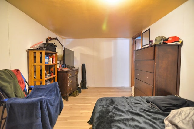 bedroom with light wood-type flooring