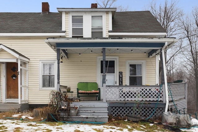 view of snow covered house