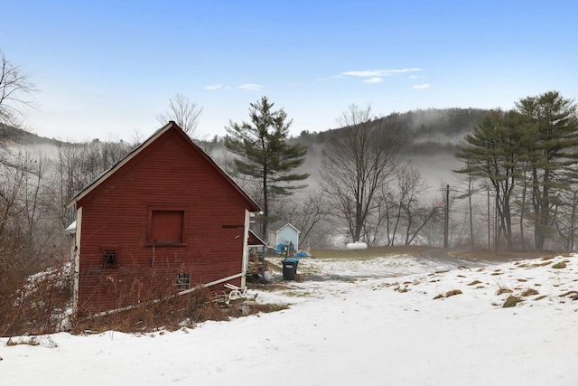 view of snow covered property