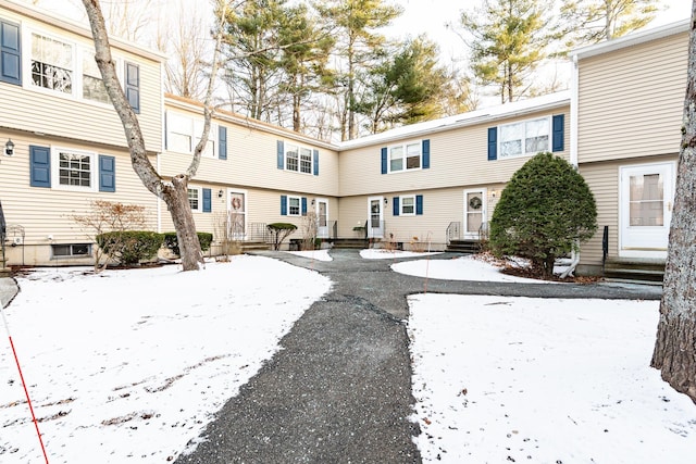 view of snow covered house