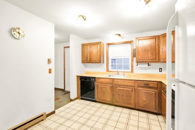 kitchen with sink, a textured ceiling, black dishwasher, a baseboard radiator, and white fridge