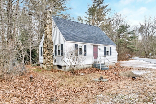 view of new england style home