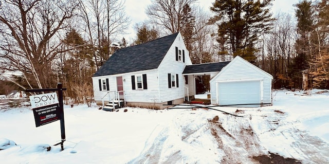 view of front of property with an outbuilding and a garage