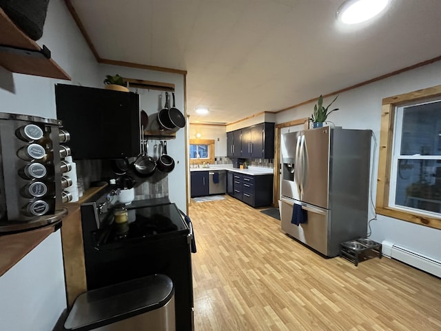 kitchen featuring backsplash, black range with electric stovetop, stainless steel refrigerator with ice dispenser, and ornamental molding