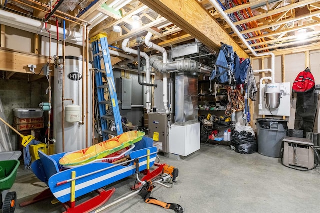 basement featuring electric panel and heating unit